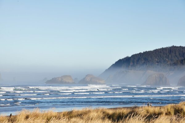 Fototapeten Strand mit Blick auf die Felsen