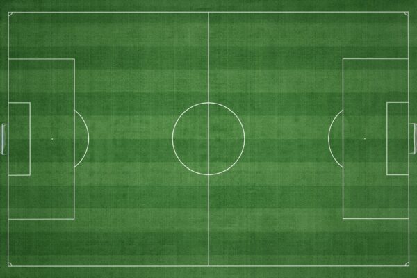 Fototapeten Grünes Fußballfeld mit Linien